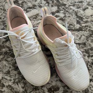 Woman’s white & pink Nike Presto